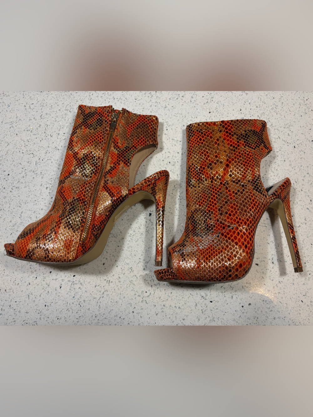 Women’s Orange Snake-Print Peep-Toe Stiletto Booties